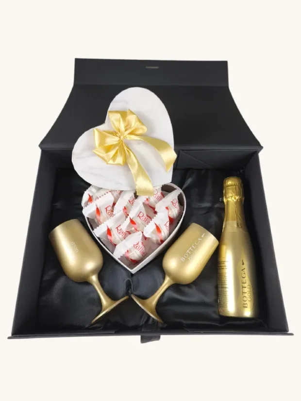 Dárkový box Bottega: zlatá láhev + zlaté skleněné sklenice, čokoládové pralinky Raffaello